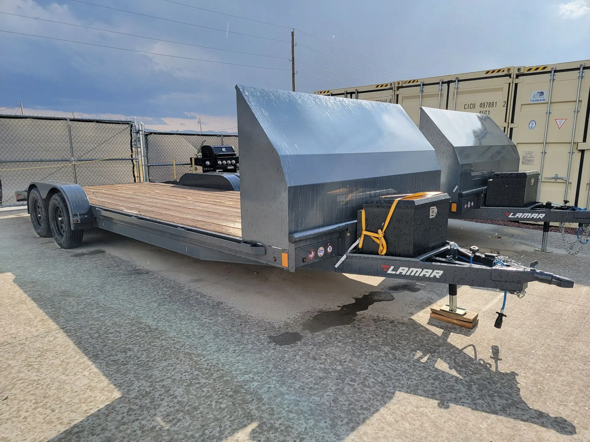 Flat bed Car Hauler for rent in Pueblo Flat bed Car Hauler with protective shield for rent